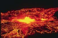 Image of Halemaumau fountains and the lava lake on Kilauea's summit at night in 1967